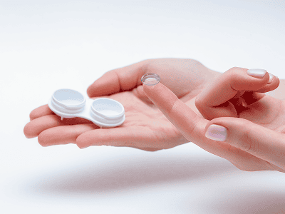 Contact lens preparation with storage case