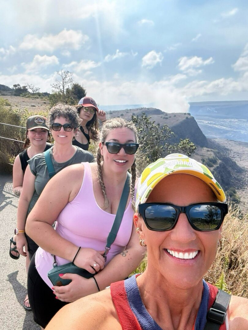 Friends posing on scenic trail