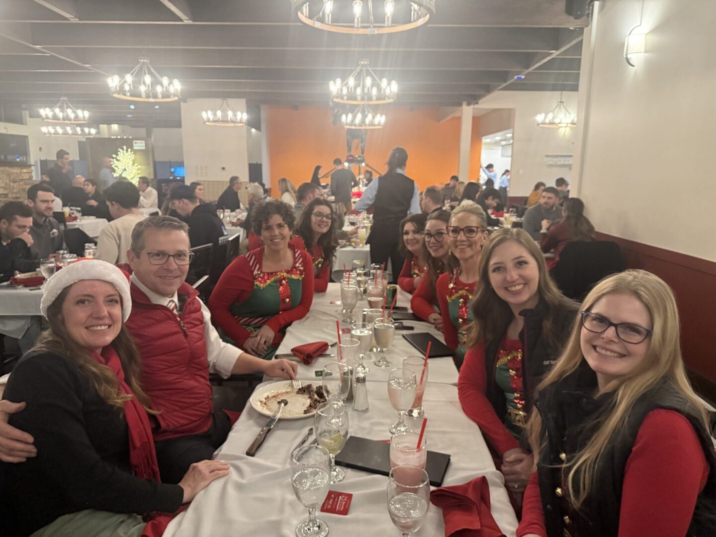 Group enjoying festive dinner at restaurant