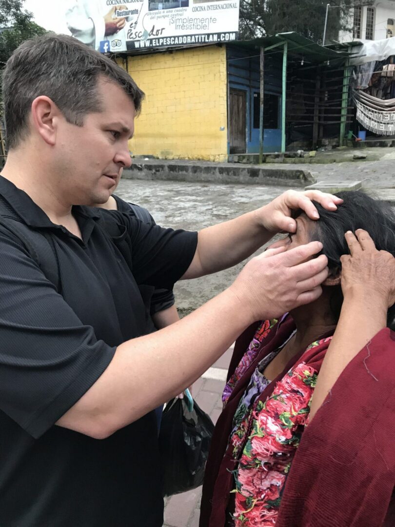Elderly woman with eye dressing